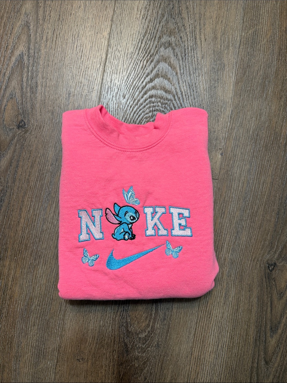 Nike Kids Hot Pink Sweatshirt with Blue Stitch & Butterfly Accent